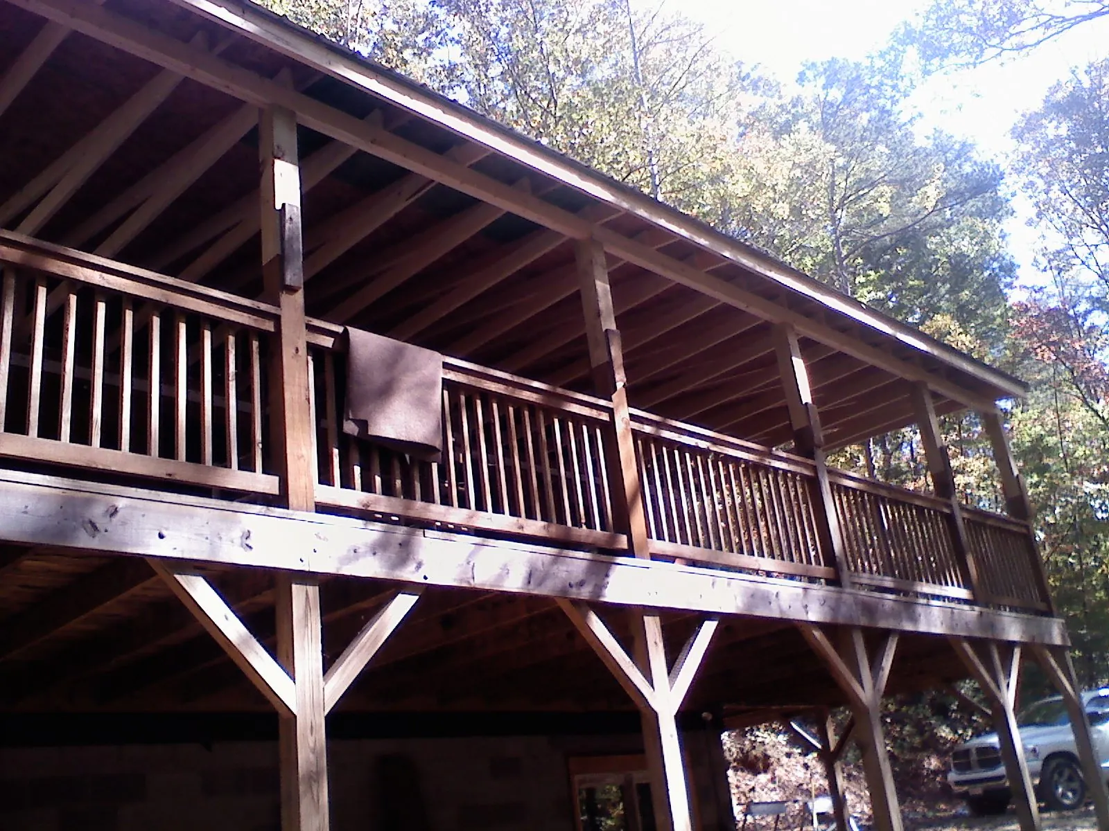 Timber framing under a new elevated porch and deck — Roof Leak Repair in Fall Creek by Roofing Brothers